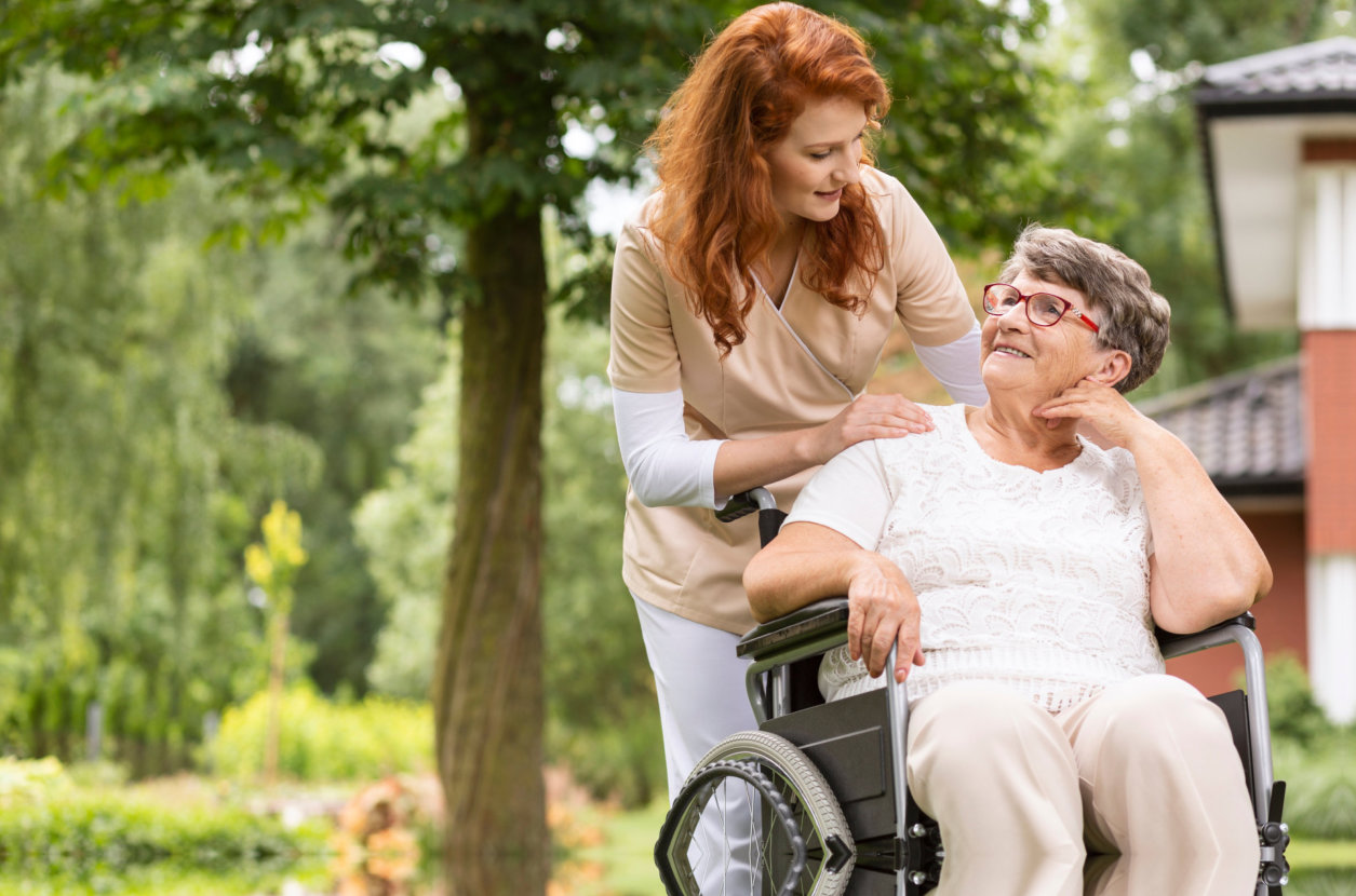 caregiver and senior talking